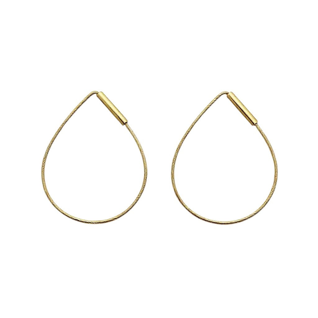 Gold hoop earrings on a white background