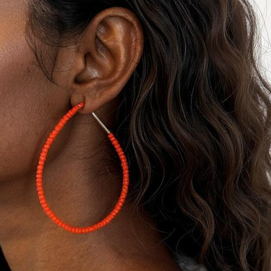 Poppy Emmanuelle Hoops size large featuring red beads on silver hoops