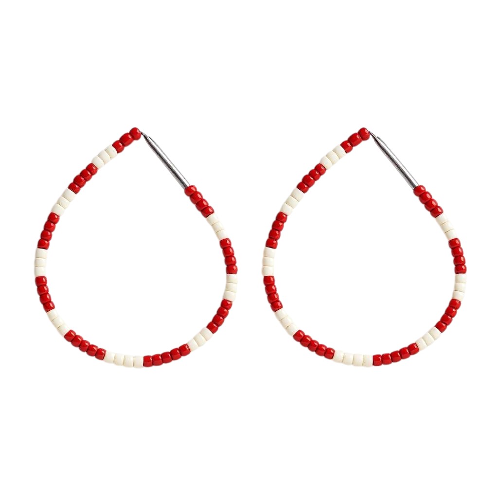 Pair of hoop earrings with red and white beads on a white background