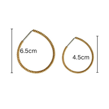 THE GOLD TEARDROP HOOPS